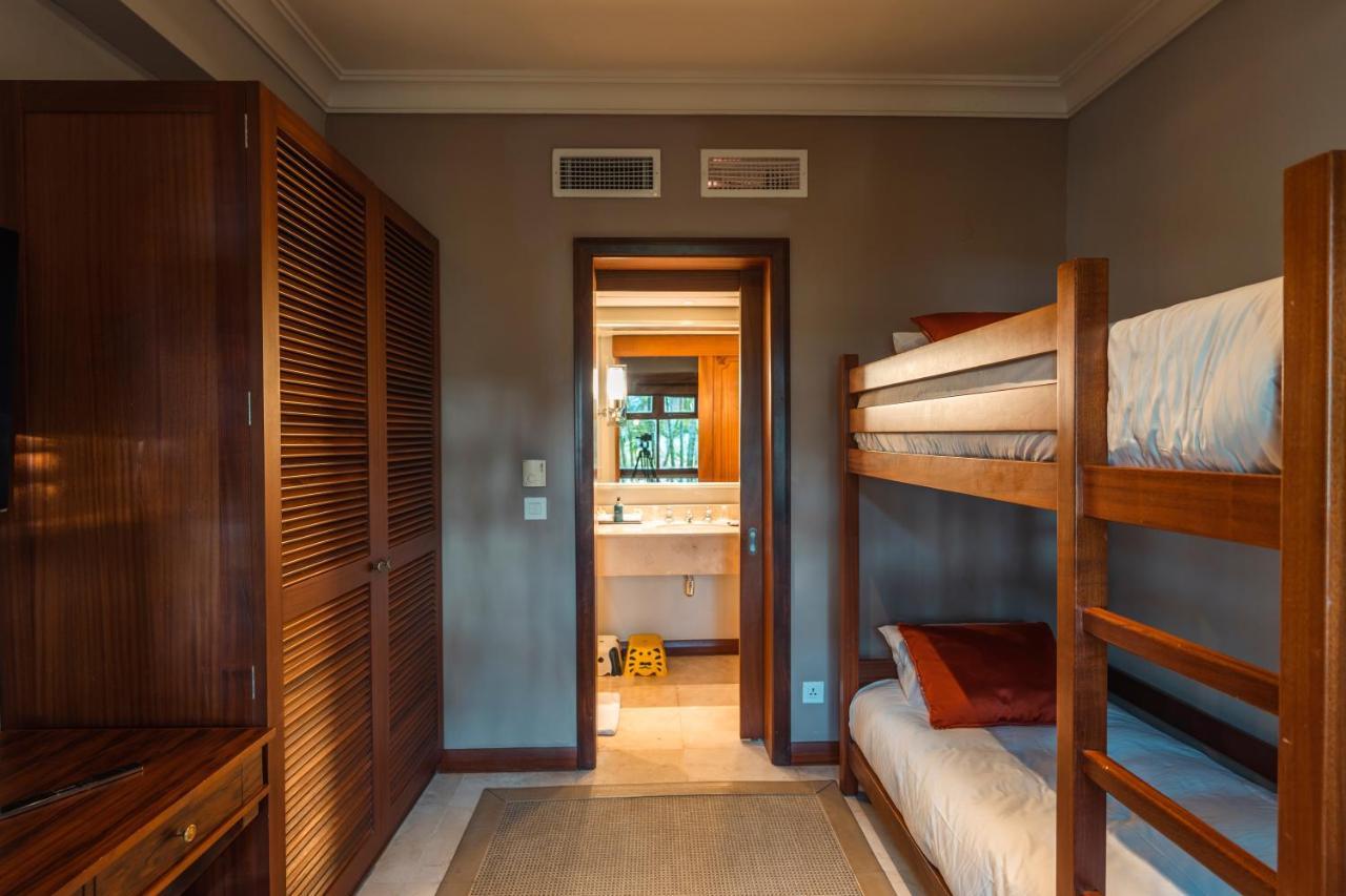 Constance Prince Maurice Посте-де-Флак Экстерьер фото A bunk bed in a hotel room